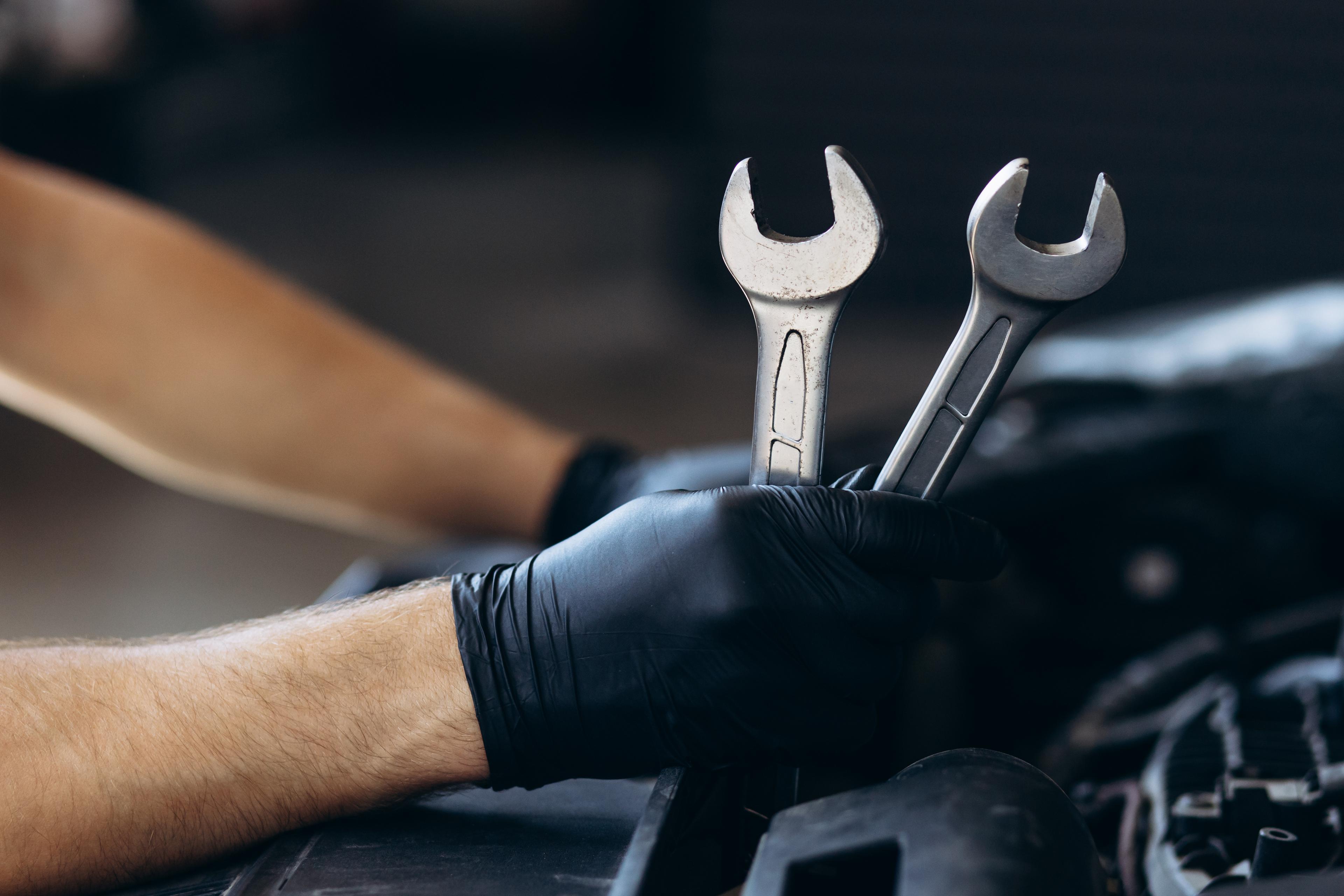 Mechanic holding a wrench