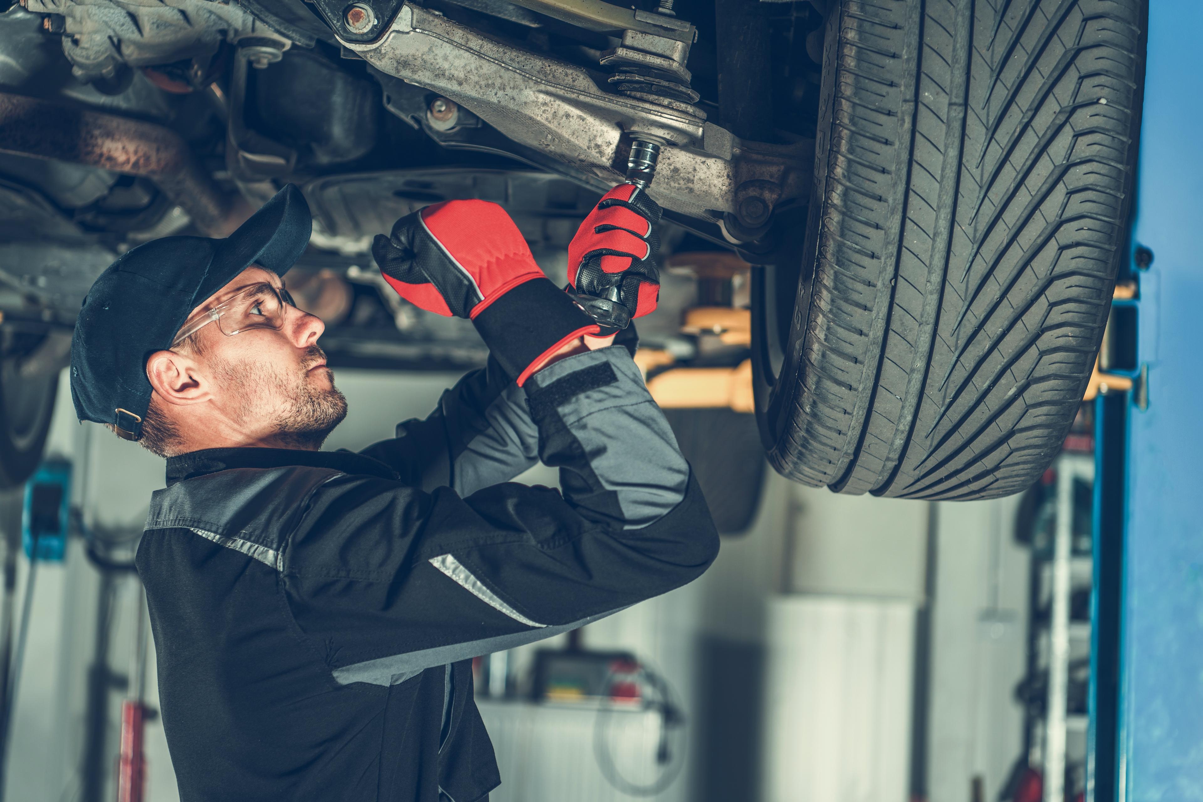 Mechanic working on a car