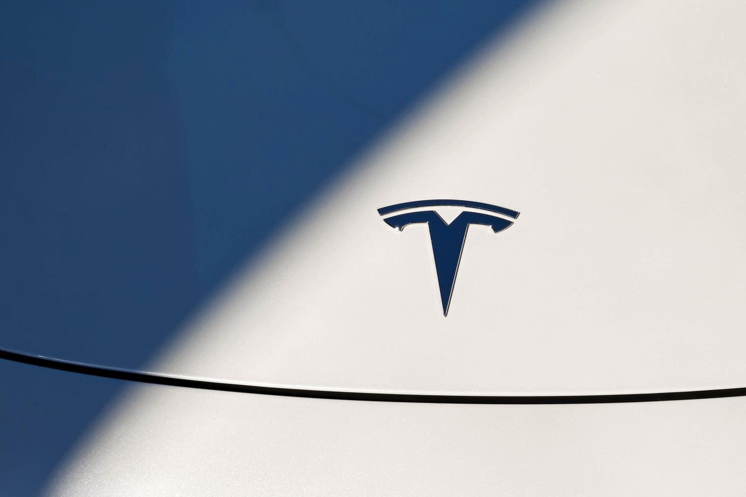 Close up of a Tesla badge