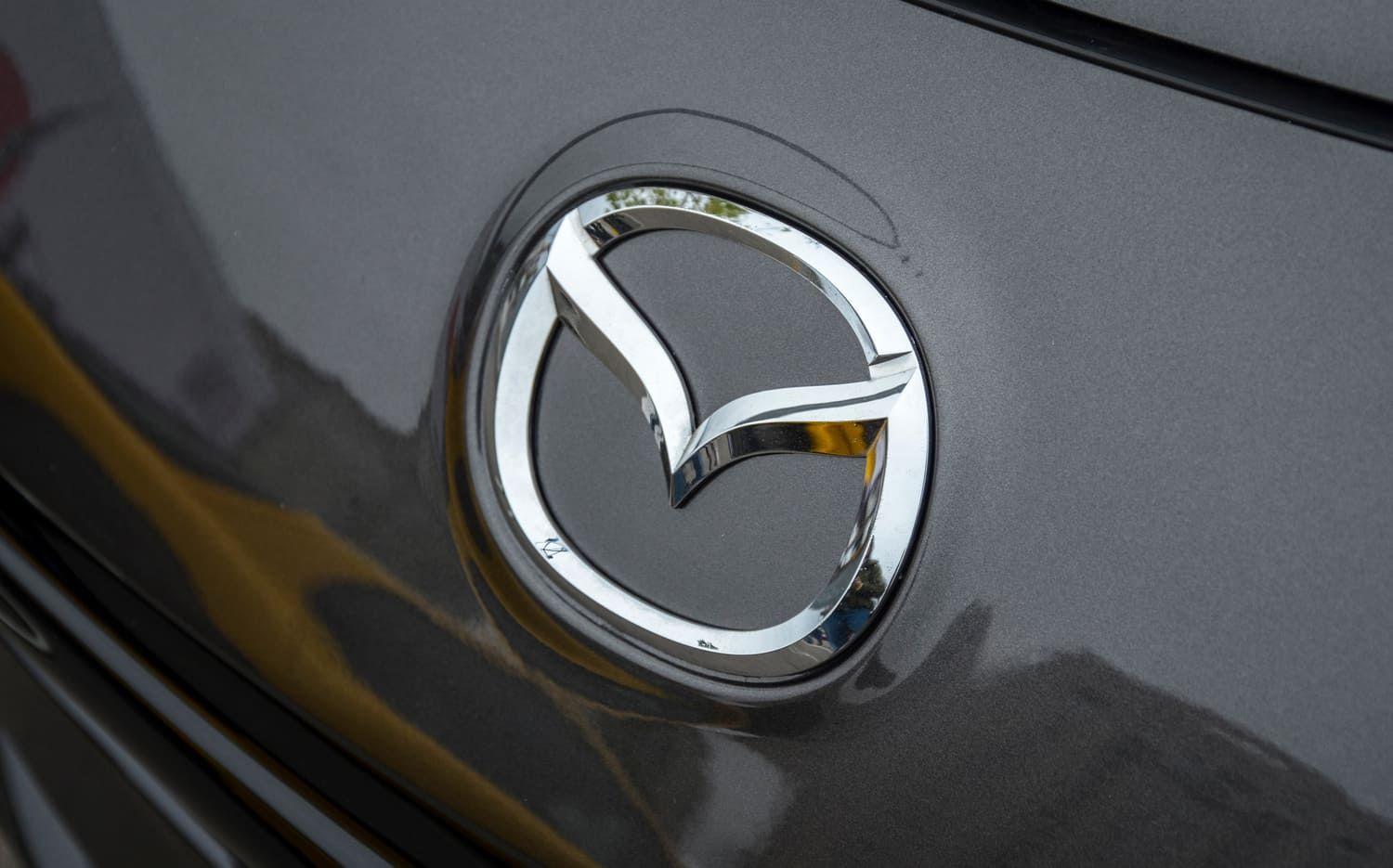 Mazda badge on a black car