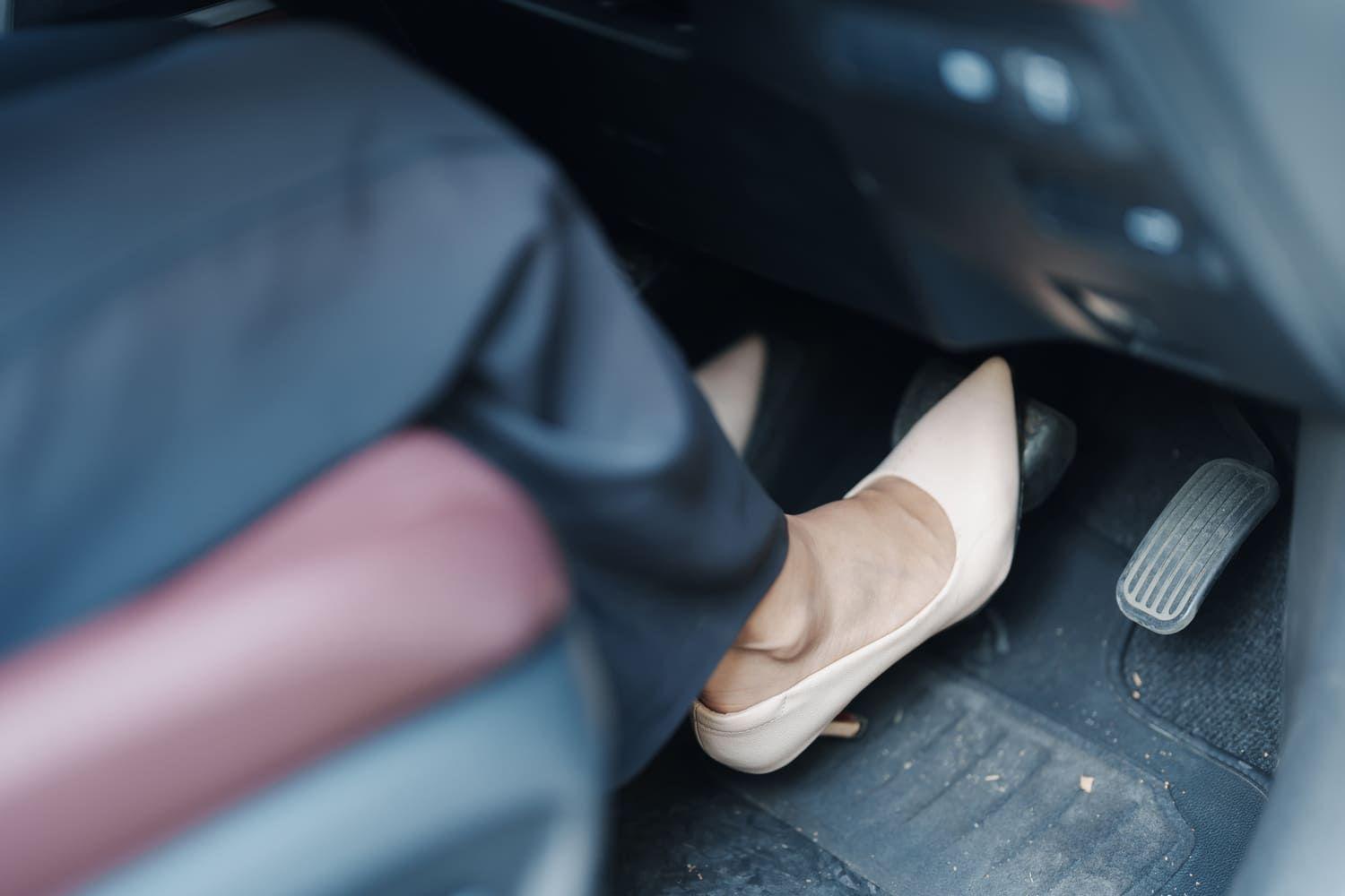 Pressing brake pedal