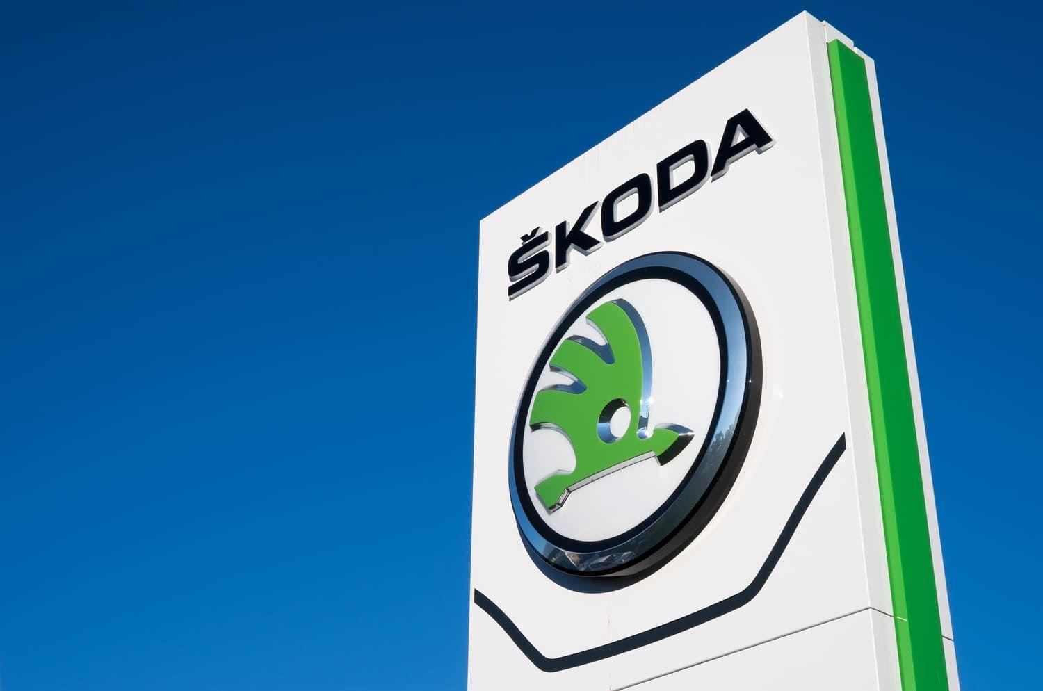 Skoda sign against a blue sky