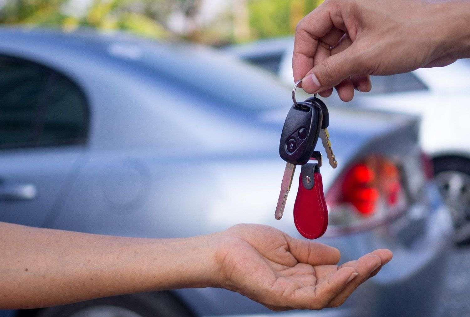 Receiving the keys to a new car