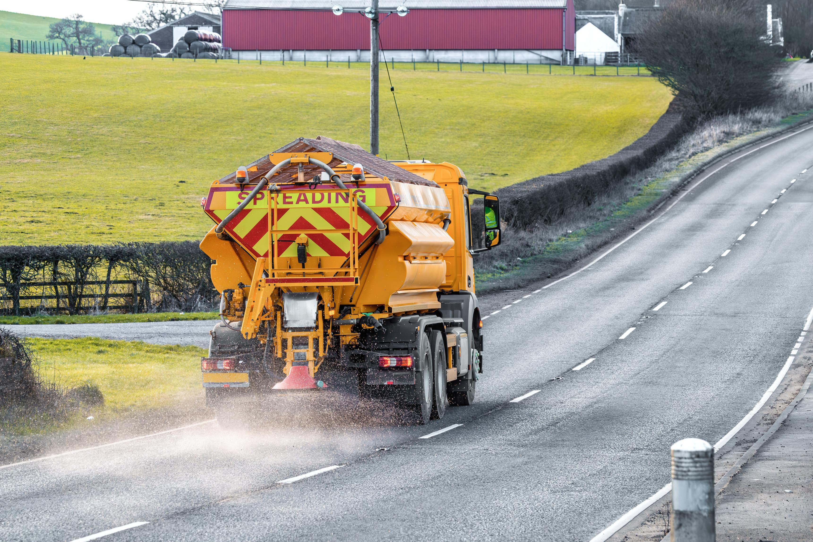 Grit spreader