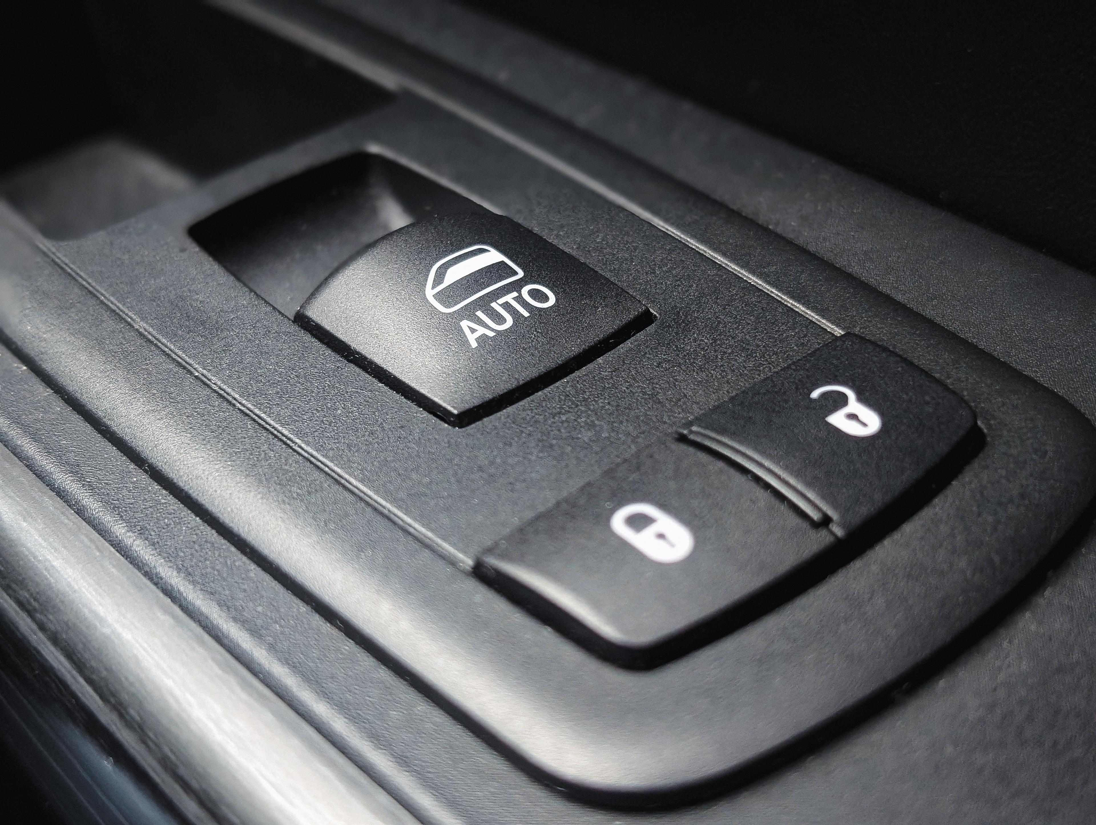 Central locking buttons