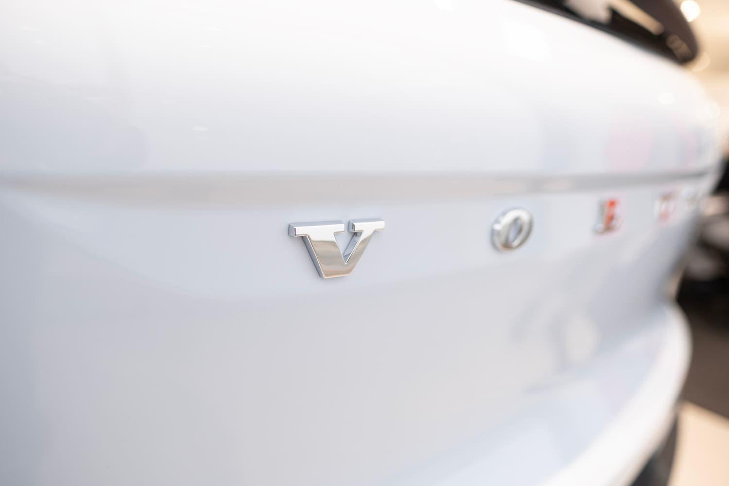 Close up of a Volvo badge on a car