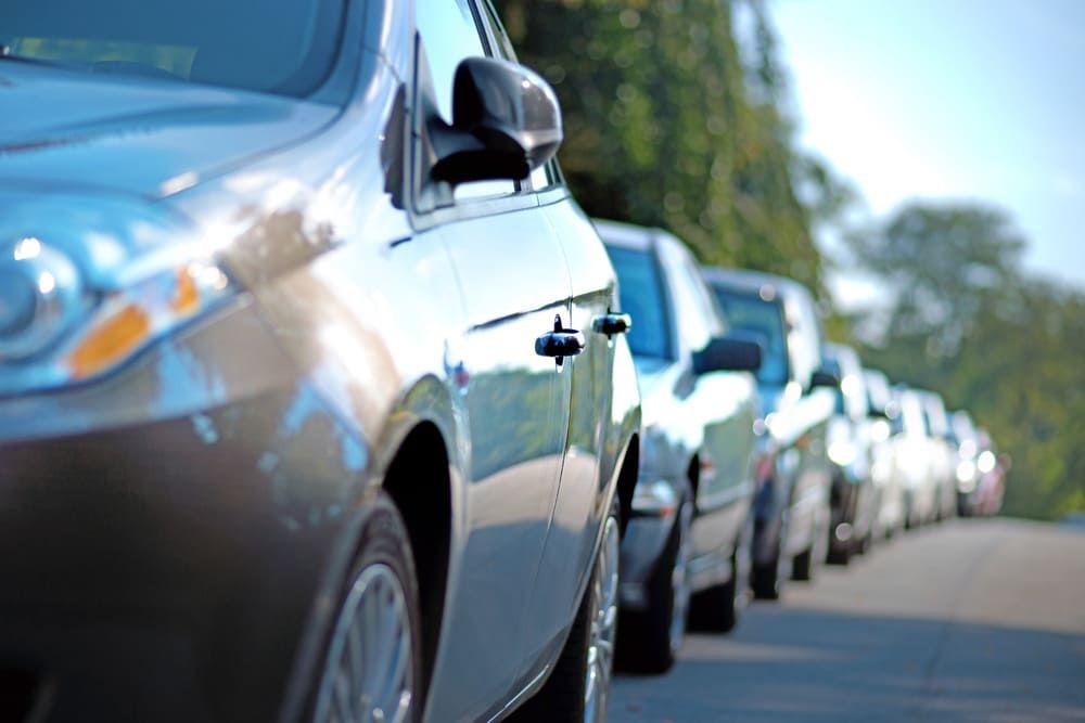 Close up of cars parked in a row