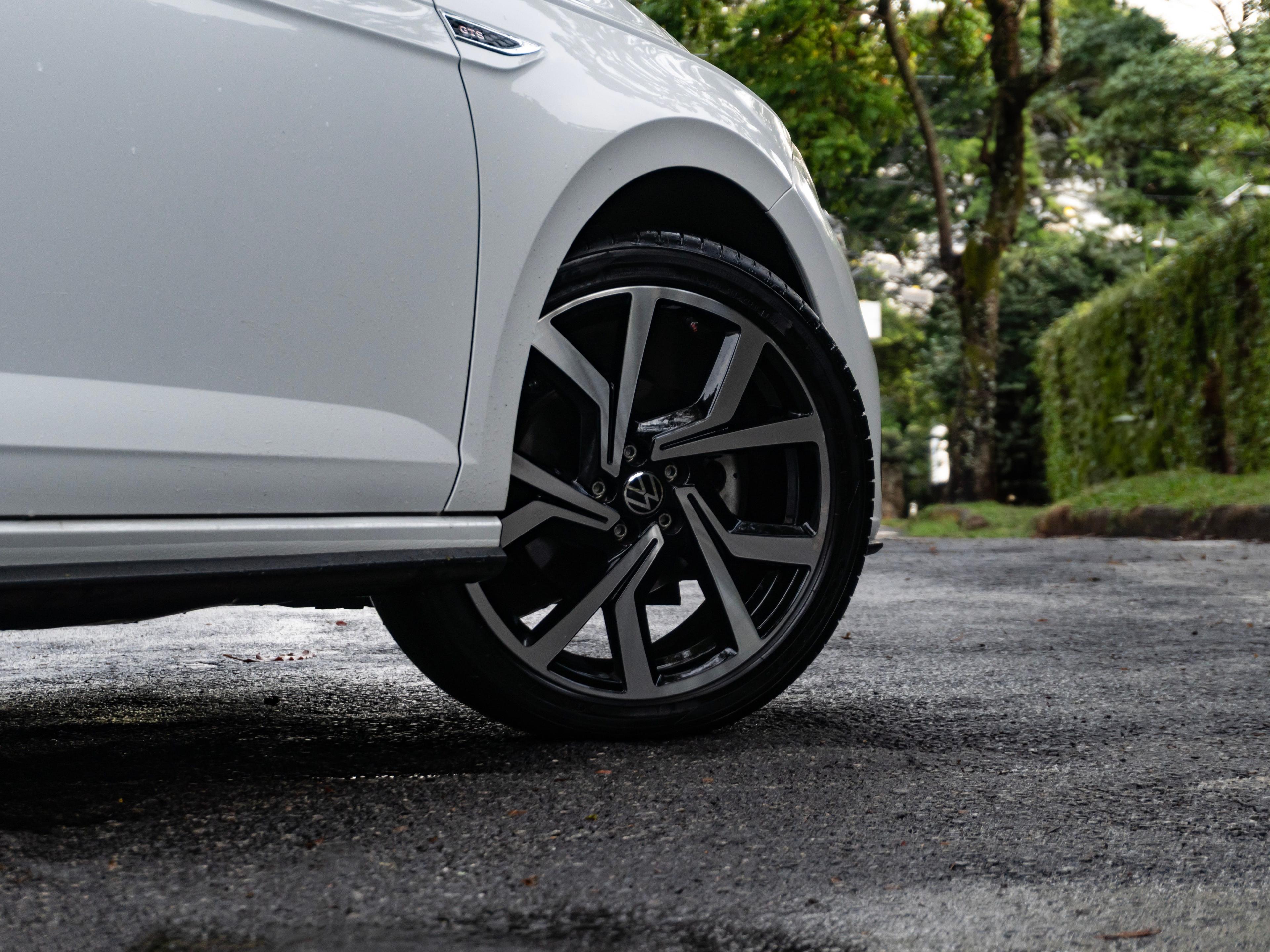 Close up of the wheel of a white car