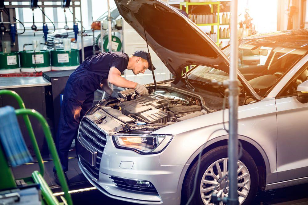 Mechanic performing an engine repair