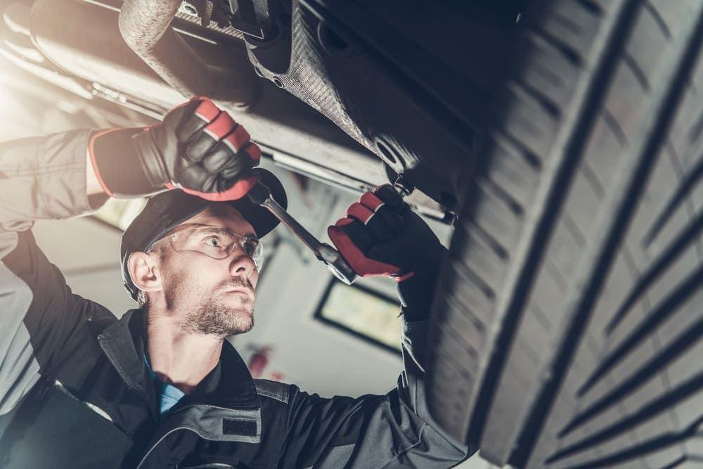 Mechanic repairs a cylinder head